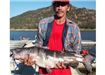 Scott Osborn of Escondido, 23.50 pound Channel Catfish caught 8-7-04 on Shiner off South Shore Rockp
