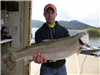 Evan Esancy of Richmond, ME, 12.80 pound trout caught 2-22-17 using a nightcrawler off the southern 