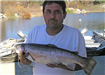 Horacio Pineda of Escondido, 6.00 pound Trout caught 12-30-11 on Plastic Worm in Boat Dock Cove