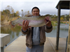 Jesse Tran of San Diego, 7.60 pound trout caught 12- 28-21 using a crappie jig in Boat Dock Cove.