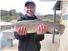 Josh Field of Escondido, 5.60 pound trout caught 2-27-23 using a nightcrawler in Boat Dock Cove.