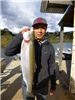 Obed Martinez of Valley Center, 6.90 pound trout caught 12-17-14 using a white jig in Boat Dock Cove