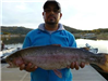 Victor Ortiz of Vista, 6.45 pound trout caugh 12-16-13 using rainbow powerbait at the East Buoy Line