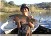 10-year-old Dylan Nguyen, 5.85 pound Trout caught 3-13-11 on Nightcrawler in Boat Dock Cove