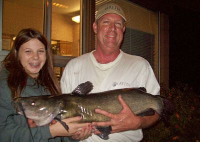 Sky and Bill McKenzy of Valley Center, 21 Pounds Catfish caught and released 8-18-11 in Trout Cove