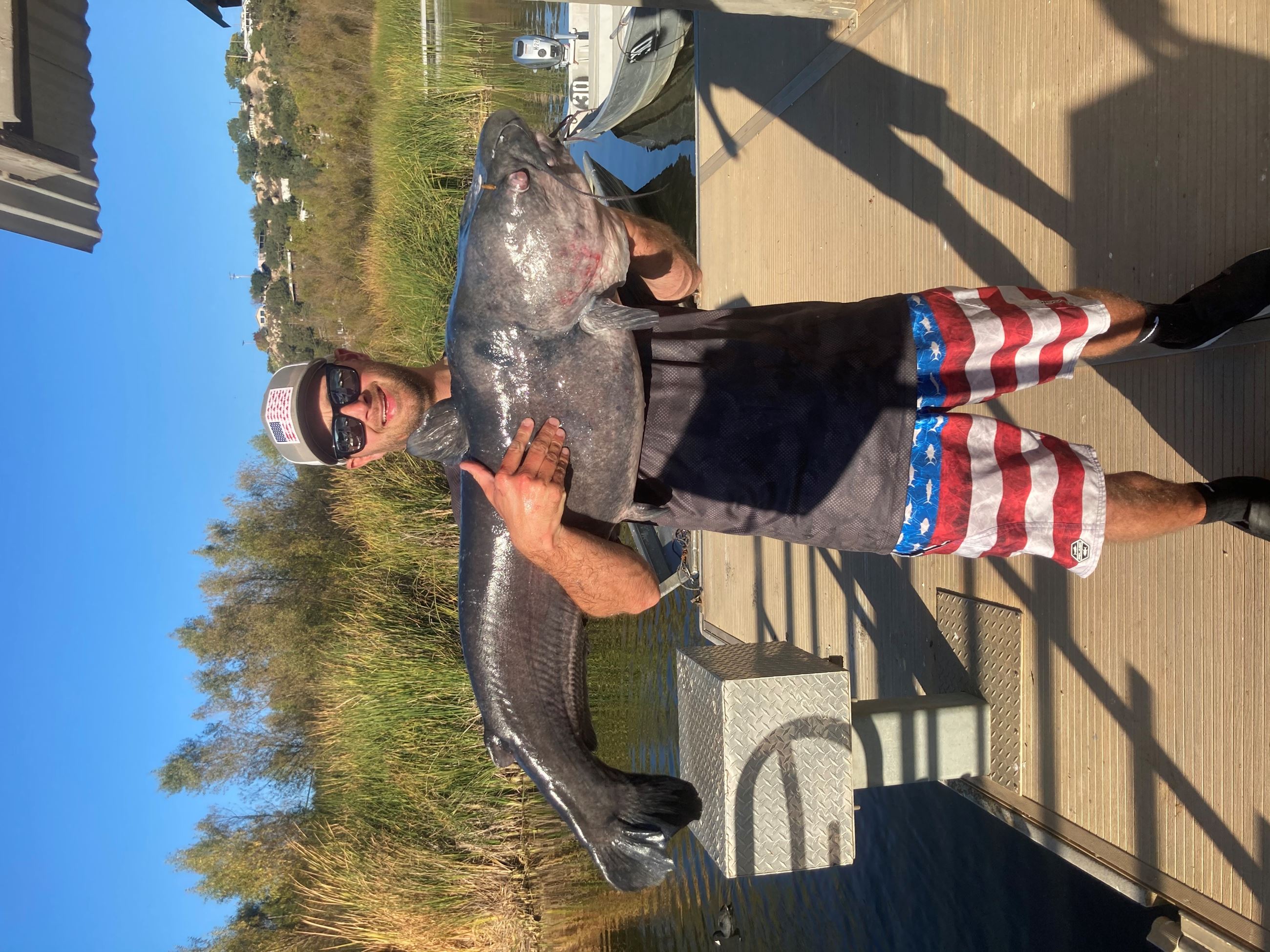 Taylor Oshinski of Valley Center, 59.80 pound Blue Catfish caught and released 1-25-21 using cut mac